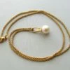 Geel gouden collier met parelhanger