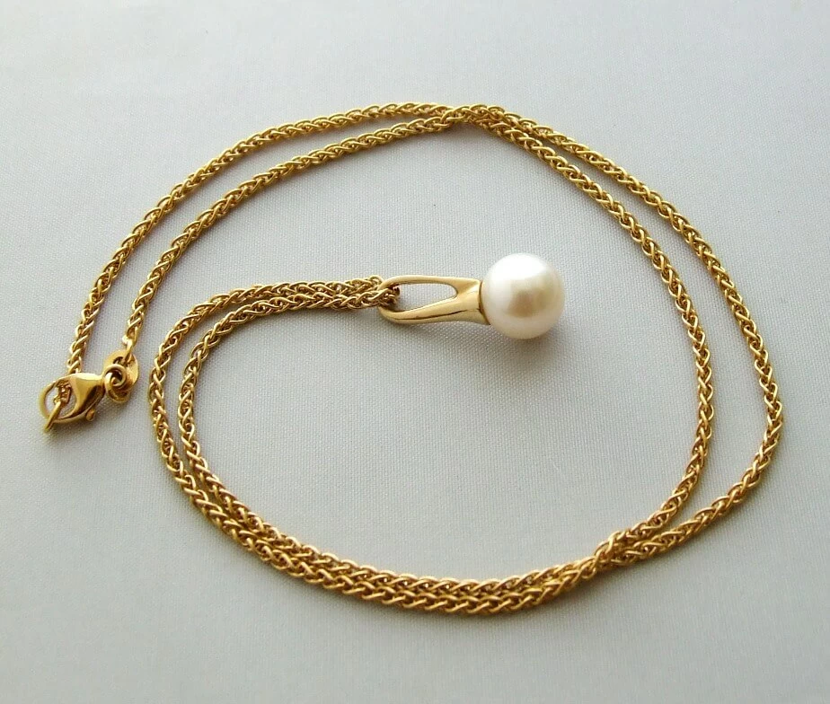 Geel gouden collier met parelhanger
