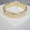 Christian 14 karaat geel gouden slavenarmband