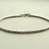 Wit gouden armband met zirkonia