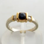 Bicolor gouden ring met diamant en saffier