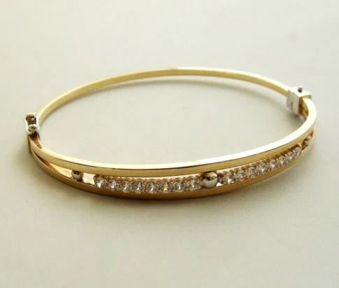 Gouden slavenarmband met zirkonia