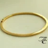 Gouden slavenarmband Atelier Christian