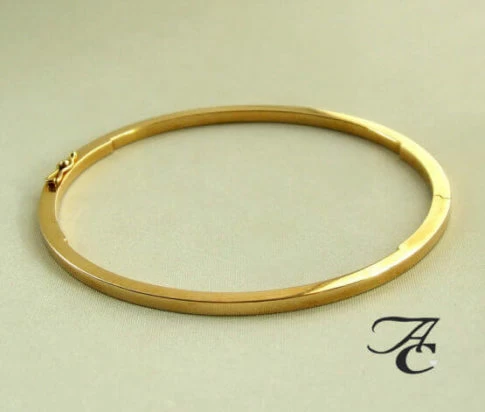 Gouden slavenarmband Atelier Christian