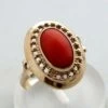 Occasion gouden ring met bloedkoraal