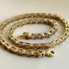 Geel- en wit gouden koningsketting