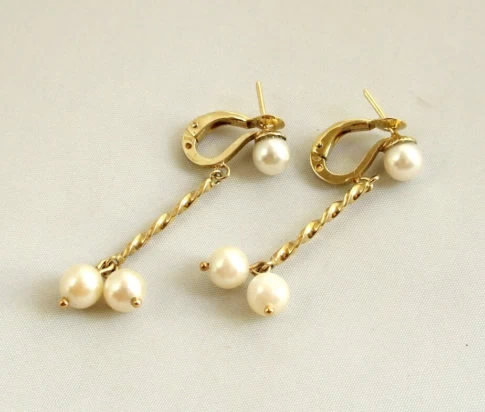 Gouden oorbellen met parels