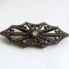 Antieke zilver op goud broche met roosdiamant