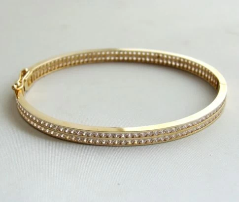 Geel gouden slavenarmband met zirkonia Christian