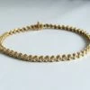 Gouden tennisarmband met diamanten