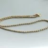 Occasion bicolor gouden collier