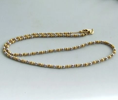 Occasion bicolor gouden collier