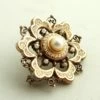 Goud en zilveren broche met parels
