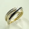Bicolor ring met diamant en saffier