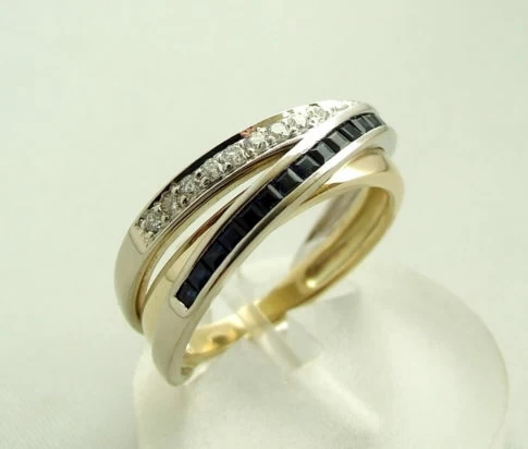 Bicolor ring met diamant en saffier