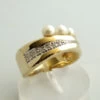 Gouden ring met diamant en parel