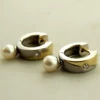Gouden creolen met diamant en parel