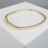 Atelier Christian geel gouden slavenarmband