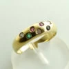 Gouden ring met diamant, robijn, saffier en smaragd