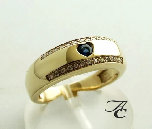 Gouden harten ring met diamanten en saffieren