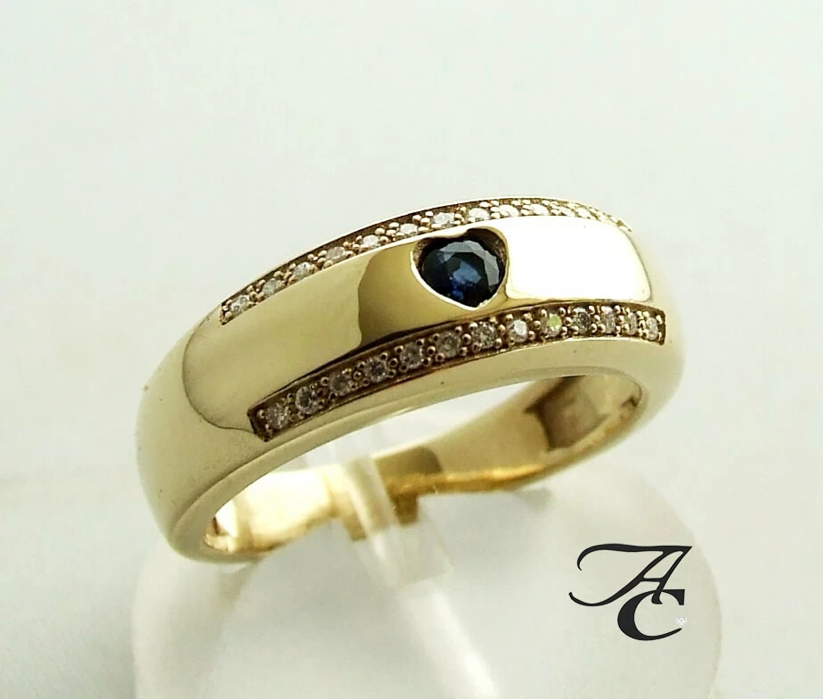 Gouden harten ring met diamanten en saffieren