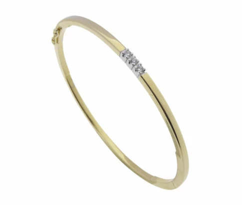 Gouden slavenarmband met diamanten