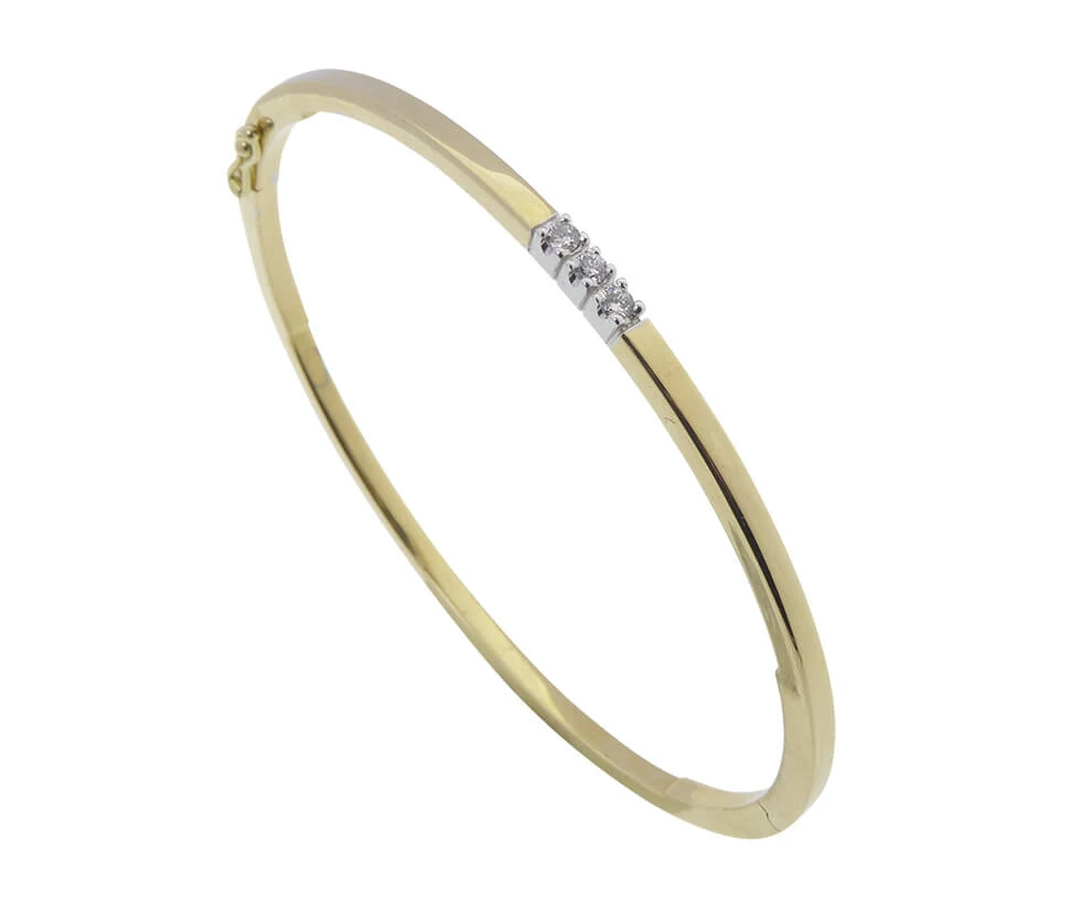 Gouden slavenarmband met diamanten