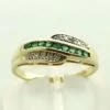 Geel gouden ring met diamant en smaragd