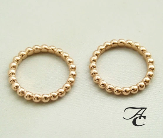Ros&eacute; gouden bolletjes ring