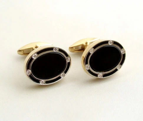Gouden diamanten manchetknopen met onyx