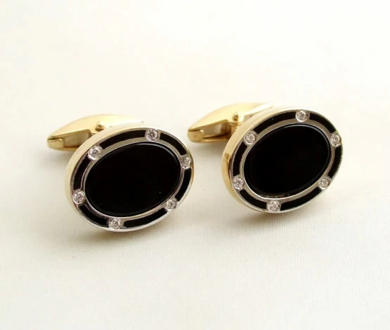 Gouden diamanten manchetknopen met onyx
