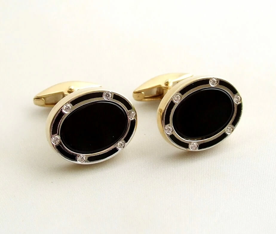 Gouden diamanten manchetknopen met onyx