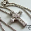 Wit gouden collier en kruis met diamanten