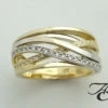 Gevlochten bicolor gouden ring met briljantenGevlochten bicolor gouden ring met briljanten