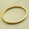 14 karaat gouden slavenarmband Christian