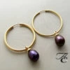 Gouden oorbellen met hangers