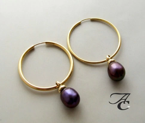 Gouden oorbellen met hangers