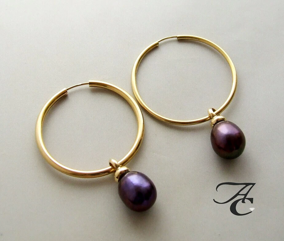 Gouden oorbellen met hangers
