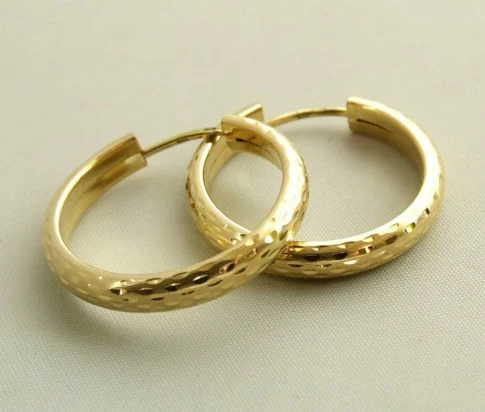 Gouden oorbellen occasion