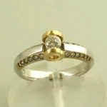 Bicolor Christian gouden ring met briljant