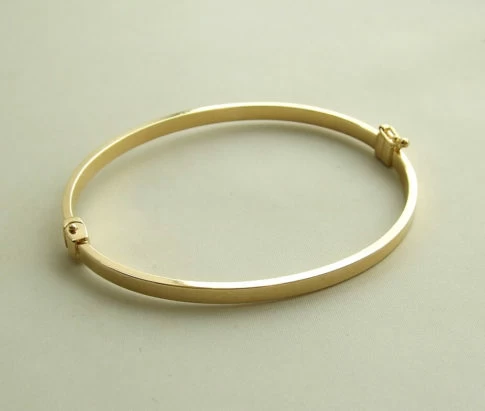 Geel gouden Christian slavenarmband