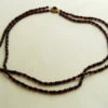 Occasion granaten collier met gouden slot