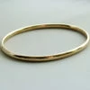 14 karaat Christian geel gouden slavenarmband