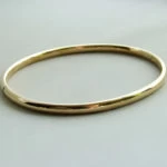 14 karaat Christian geel gouden slavenarmband