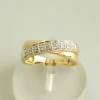 Gevlochten gouden ring met diamanten