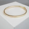 14 karaat geel gouden Christian slavenarmband