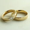 Christian gouden trouwringen met diamant
