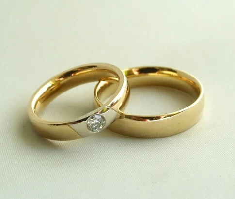 Christian gouden trouwringen met diamant