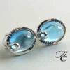 Wit gouden oorbellen met topaas en diamant