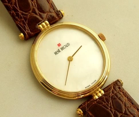 Gouden Rene Becaud horloge